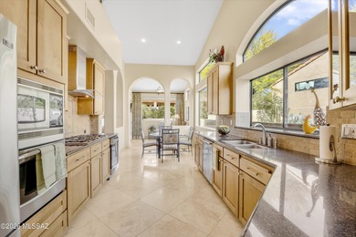 Beautifully remodeled Foothills home featuring travertine floors on The Lodge at Ventana Canyon - Canyon  in Arizona - for sale on GolfHomes.com, golf home, golf lot