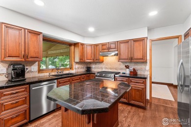Elegantly positioned on a spacious corner lot in coveted Paragon on Southridge Golf Club in Colorado - for sale on GolfHomes.com, golf home, golf lot