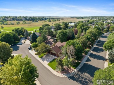 Elegantly positioned on a spacious corner lot in coveted Paragon on Southridge Golf Club in Colorado - for sale on GolfHomes.com, golf home, golf lot