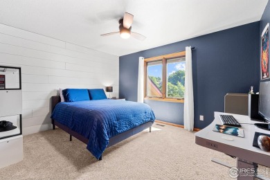 Elegantly positioned on a spacious corner lot in coveted Paragon on Southridge Golf Club in Colorado - for sale on GolfHomes.com, golf home, golf lot