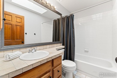Elegantly positioned on a spacious corner lot in coveted Paragon on Southridge Golf Club in Colorado - for sale on GolfHomes.com, golf home, golf lot