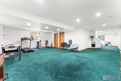 Elegantly positioned on a spacious corner lot in coveted Paragon on Southridge Golf Club in Colorado - for sale on GolfHomes.com, golf home, golf lot