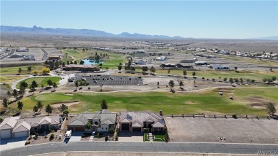 Explore this quarter-acre lot in one of Fort Mohave's top on Los Lagos Golf Club in Arizona - for sale on GolfHomes.com, golf home, golf lot