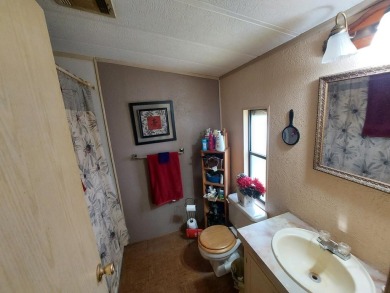 This home has great 'bones' with lots of potential for the right on Lakes at Leesburg Golf Course in Florida - for sale on GolfHomes.com, golf home, golf lot