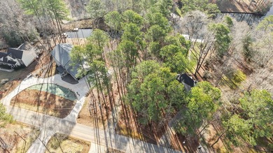 Build your dream waterfront home in the gated, resort-style on River Golf and Country Club at Lake Royale in North Carolina - for sale on GolfHomes.com, golf home, golf lot