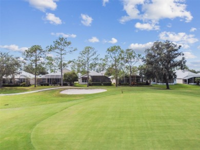 Beautifully renovated, gated, GOLF course views on Lexington Oaks Golf Club in Florida - for sale on GolfHomes.com, golf home, golf lot