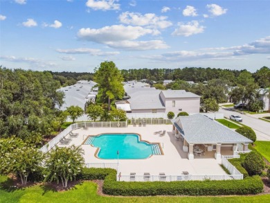 Beautifully renovated, gated, GOLF course views on Lexington Oaks Golf Club in Florida - for sale on GolfHomes.com, golf home, golf lot