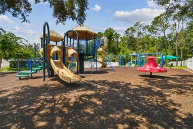 Beautifully renovated, gated, GOLF course views on Lexington Oaks Golf Club in Florida - for sale on GolfHomes.com, golf home, golf lot