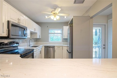 Check out this move-in ready 3BR/2.5BA home with an attached on Cypress Lake Country Club in Florida - for sale on GolfHomes.com, golf home, golf lot