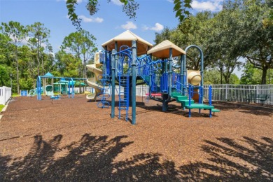 Beautifully renovated, gated, GOLF course views on Lexington Oaks Golf Club in Florida - for sale on GolfHomes.com, golf home, golf lot
