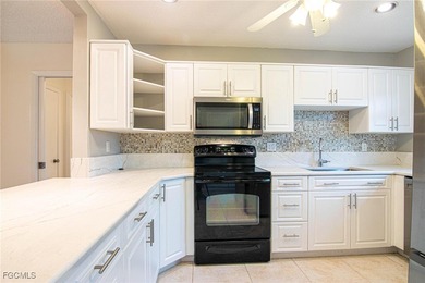 Check out this move-in ready 3BR/2.5BA home with an attached on Cypress Lake Country Club in Florida - for sale on GolfHomes.com, golf home, golf lot