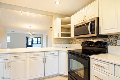 Check out this move-in ready 3BR/2.5BA home with an attached on Cypress Lake Country Club in Florida - for sale on GolfHomes.com, golf home, golf lot