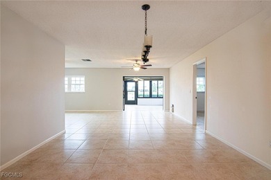 Check out this move-in ready 3BR/2.5BA home with an attached on Cypress Lake Country Club in Florida - for sale on GolfHomes.com, golf home, golf lot