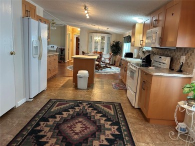 Park East is an age 55+ Resident Owned Cooperative (Co-op) on Polo Park East in Florida - for sale on GolfHomes.com, golf home, golf lot