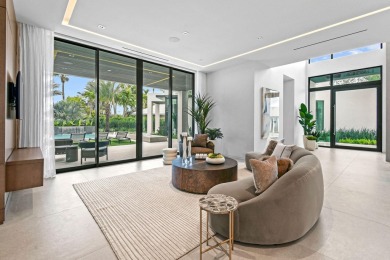 Welcome to a modern masterpiece in the prestigious Admirals Cove on Jonathans Landing Golf Club in Florida - for sale on GolfHomes.com, golf home, golf lot