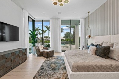 Welcome to a modern masterpiece in the prestigious Admirals Cove on Jonathans Landing Golf Club in Florida - for sale on GolfHomes.com, golf home, golf lot