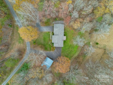 Tucked away in the woods, this 2-bedroom, 2-bathroom home on on River Oaks Country Club in North Carolina - for sale on GolfHomes.com, golf home, golf lot