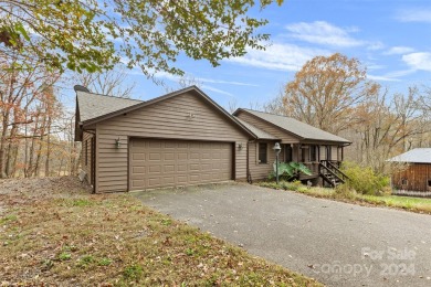 Tucked away in the woods, this 2-bedroom, 2-bathroom home on on River Oaks Country Club in North Carolina - for sale on GolfHomes.com, golf home, golf lot