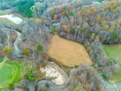 Tucked away in the woods, this 2-bedroom, 2-bathroom home on on River Oaks Country Club in North Carolina - for sale on GolfHomes.com, golf home, golf lot