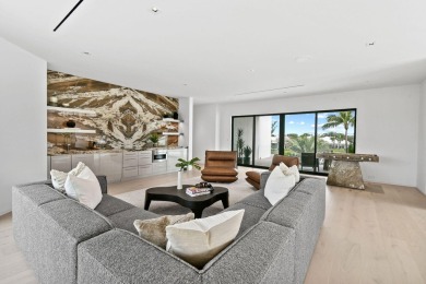 Welcome to a modern masterpiece in the prestigious Admirals Cove on Jonathans Landing Golf Club in Florida - for sale on GolfHomes.com, golf home, golf lot