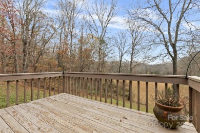 Tucked away in the woods, this 2-bedroom, 2-bathroom home on on River Oaks Country Club in North Carolina - for sale on GolfHomes.com, golf home, golf lot