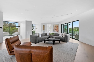 Welcome to a modern masterpiece in the prestigious Admirals Cove on Jonathans Landing Golf Club in Florida - for sale on GolfHomes.com, golf home, golf lot