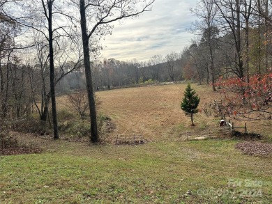 Tucked away in the woods, this 2-bedroom, 2-bathroom home on on River Oaks Country Club in North Carolina - for sale on GolfHomes.com, golf home, golf lot