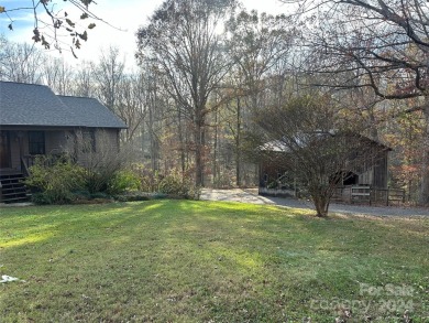 Tucked away in the woods, this 2-bedroom, 2-bathroom home on on River Oaks Country Club in North Carolina - for sale on GolfHomes.com, golf home, golf lot