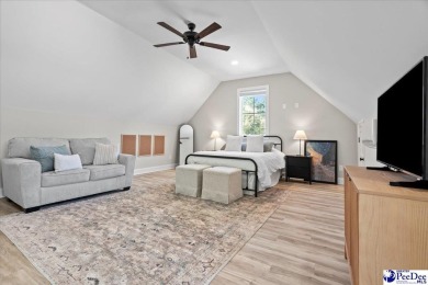 What a beautiful home! The stone entry way brings warmth and on Hartsville Country Club in South Carolina - for sale on GolfHomes.com, golf home, golf lot