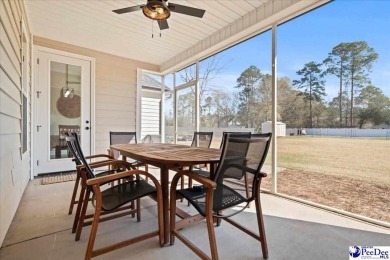 What a beautiful home! The stone entry way brings warmth and on Hartsville Country Club in South Carolina - for sale on GolfHomes.com, golf home, golf lot