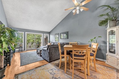 Discover this end-unit townhome with seasonal views of Lake on Bella Vista Country Club - Berksdale in Arkansas - for sale on GolfHomes.com, golf home, golf lot
