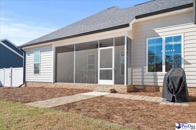 What a beautiful home! The stone entry way brings warmth and on Hartsville Country Club in South Carolina - for sale on GolfHomes.com, golf home, golf lot
