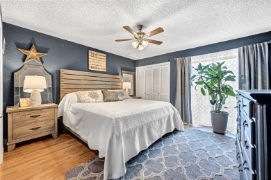 Discover this end-unit townhome with seasonal views of Lake on Bella Vista Country Club - Berksdale in Arkansas - for sale on GolfHomes.com, golf home, golf lot
