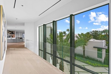 Welcome to a modern masterpiece in the prestigious Admirals Cove on Jonathans Landing Golf Club in Florida - for sale on GolfHomes.com, golf home, golf lot