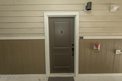 Better than new 2nd floor 3BR/2BA unit in the most coveted condo on Crow Creek Golf Club in North Carolina - for sale on GolfHomes.com, golf home, golf lot