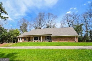 Beautiful brick and HardiePlank home located directly across on Chattahoochee Golf Course in Georgia - for sale on GolfHomes.com, golf home, golf lot