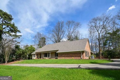 Beautiful brick and HardiePlank home located directly across on Chattahoochee Golf Course in Georgia - for sale on GolfHomes.com, golf home, golf lot