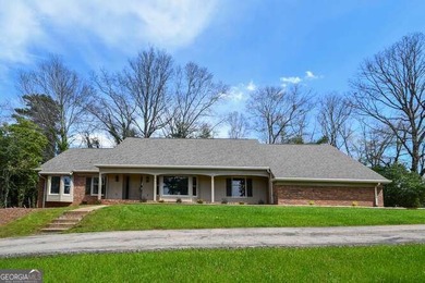 Beautiful brick and HardiePlank home located directly across on Chattahoochee Golf Course in Georgia - for sale on GolfHomes.com, golf home, golf lot
