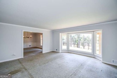 Beautiful brick and HardiePlank home located directly across on Chattahoochee Golf Course in Georgia - for sale on GolfHomes.com, golf home, golf lot