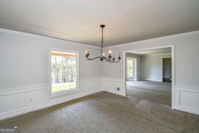 Beautiful brick and HardiePlank home located directly across on Chattahoochee Golf Course in Georgia - for sale on GolfHomes.com, golf home, golf lot