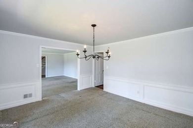 Beautiful brick and HardiePlank home located directly across on Chattahoochee Golf Course in Georgia - for sale on GolfHomes.com, golf home, golf lot