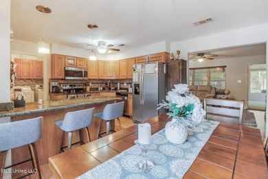 MOTIVATED SELLERS:  (** This house comes with an option for a on Diamondhead Country Club in Mississippi - for sale on GolfHomes.com, golf home, golf lot