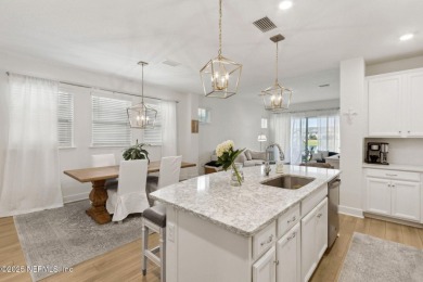 This beautifully designed 3-bedroom, 2-bath home sits on a on Golf Club At South Hampton in Florida - for sale on GolfHomes.com, golf home, golf lot