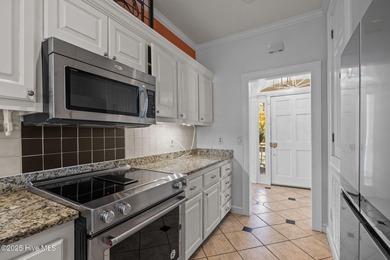 This lovely 2134 square foot home sits on a corner lot in a on Brandywine Bay Golf Club in North Carolina - for sale on GolfHomes.com, golf home, golf lot