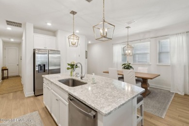This beautifully designed 3-bedroom, 2-bath home sits on a on Golf Club At South Hampton in Florida - for sale on GolfHomes.com, golf home, golf lot
