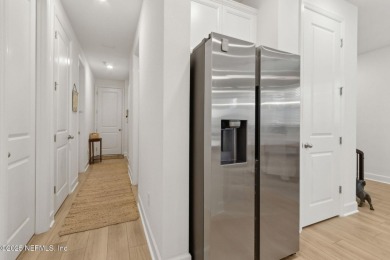 This beautifully designed 3-bedroom, 2-bath home sits on a on Golf Club At South Hampton in Florida - for sale on GolfHomes.com, golf home, golf lot