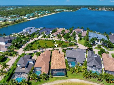 Open-concept waterfront single-family home in #1 Miromar Lakes on Miromar Lakes Golf Club in Florida - for sale on GolfHomes.com, golf home, golf lot