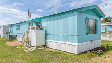 Beautiful 2 Bedrooms and 1.5 Bathroom located in Coastal Mobile on The Country Club of the Crystal Coast in North Carolina - for sale on GolfHomes.com, golf home, golf lot