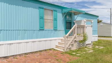 Beautiful 2 Bedrooms and 1.5 Bathroom located in Coastal Mobile on The Country Club of the Crystal Coast in North Carolina - for sale on GolfHomes.com, golf home, golf lot