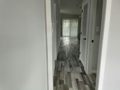 Welcome to your dream home in The Arbors at Countrywood, a on Golden Lakes Golf Course in Florida - for sale on GolfHomes.com, golf home, golf lot